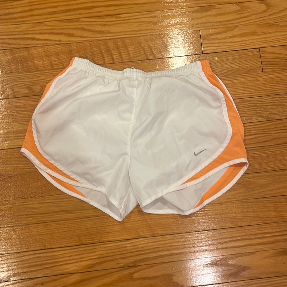 White and orange nike dry fit shorts size small.